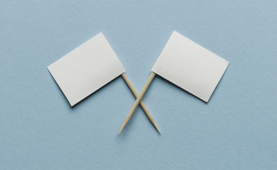 white flags crossed