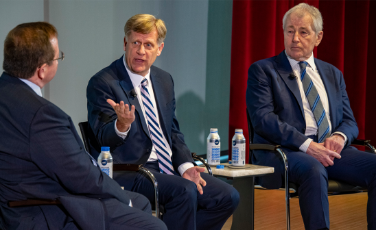 Prof. Robert Pape (left) moderates a conversation between former U.S. Ambassador to Russia Michael McFaul (center) and former Secretary of Defense Chuck Hagel during the Hagel Lecture March 24 at the Rubenstein Forum.