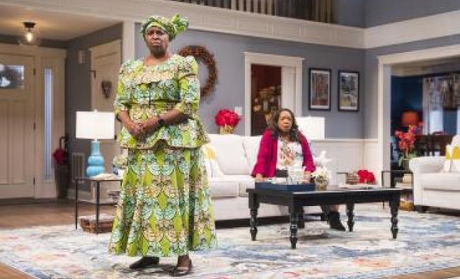 Actors on the set of Familiar play