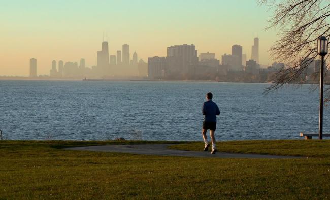 man running along the chicago lakefront