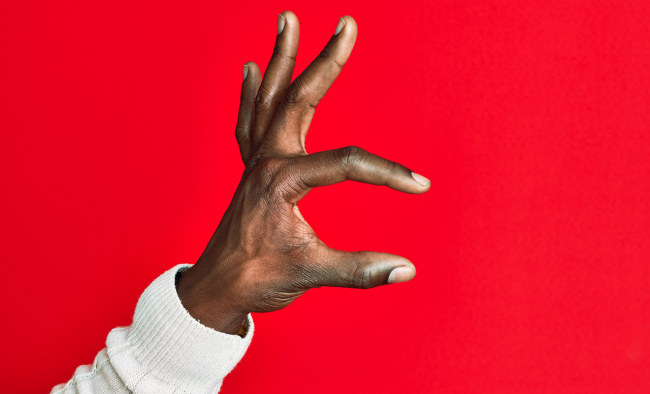 a hand gesturing in indication of something's size