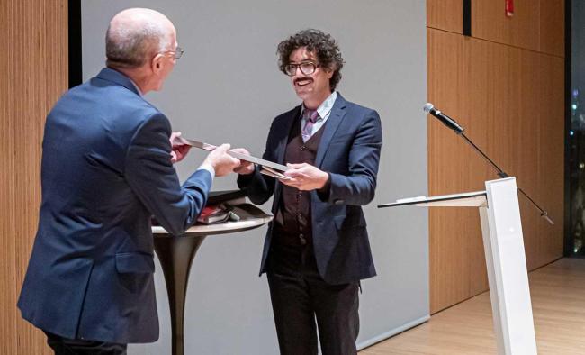 Michael Rossi accepting award