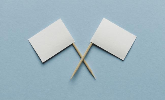 white flags crossed