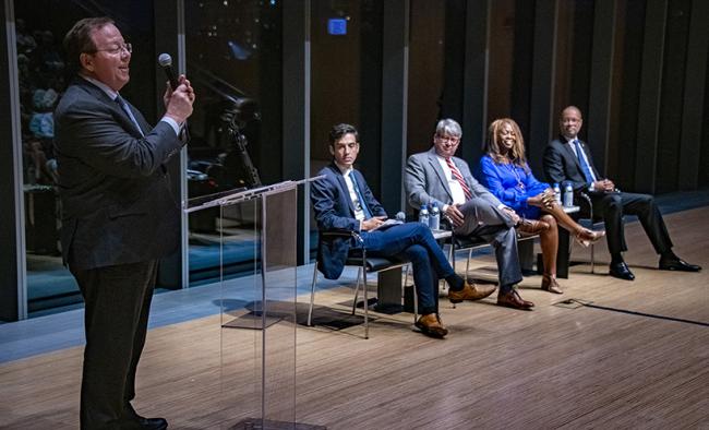 From left to right – Robert Pape at the podium, moderator Sam Levine, Gabe Sterling, LaTosha Brown, and Aaron Ford at Chicago Project on Security & Threats event