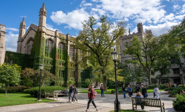 students walking in harper quadrangle