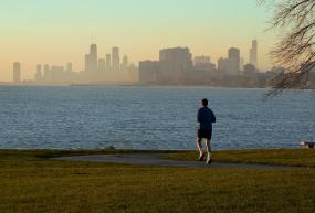 man running along the chicago lakefront