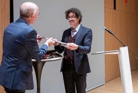 Michael Rossi accepting award