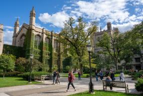 students walking in harper quadrangle